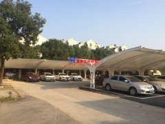 做個膜結構車棚大約要多少錢?張拉膜車棚廠家萬豪帶你來了解一下